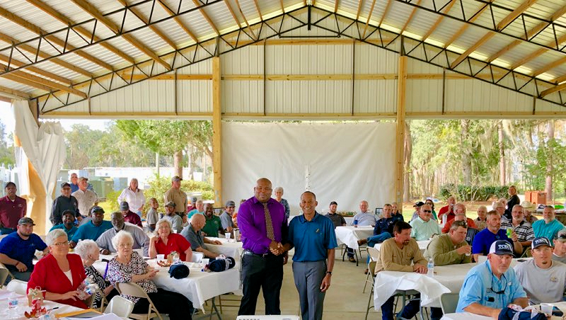 Tri-County Electric Cooperative CEO Julius Hackett thanks W.C. Blackmon for his presentation at an employee event in Madison, FL, on November 9, 2018.