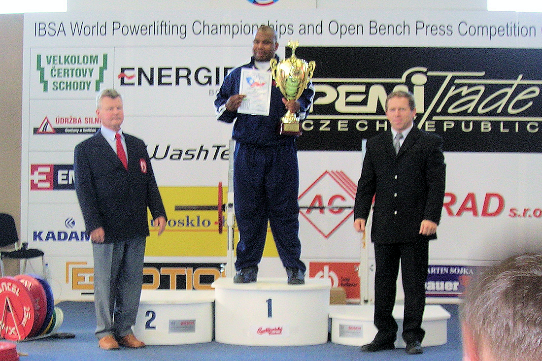 W.C. Blackmon receives the First place Bench Press trophy and World Record for bench press at the 2005 World Blind Power Lifting Competition.