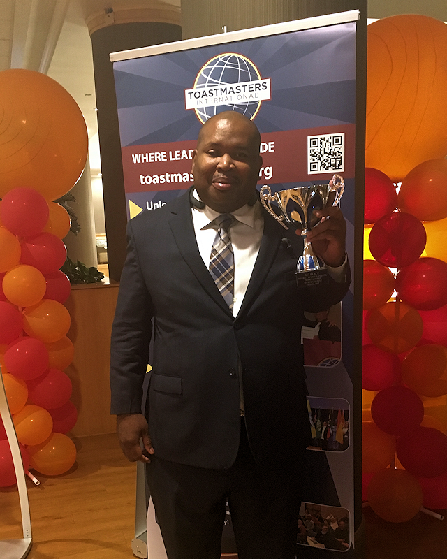 W.C. Blackmon poses with his trophy after winning the Toastmasters District 84 Championship in Orlando in May 2017.